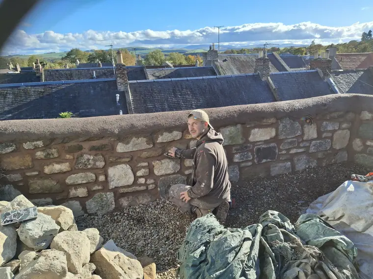 Every stone is picked and placed by hand — there is no shortcut to a wall that sits right.